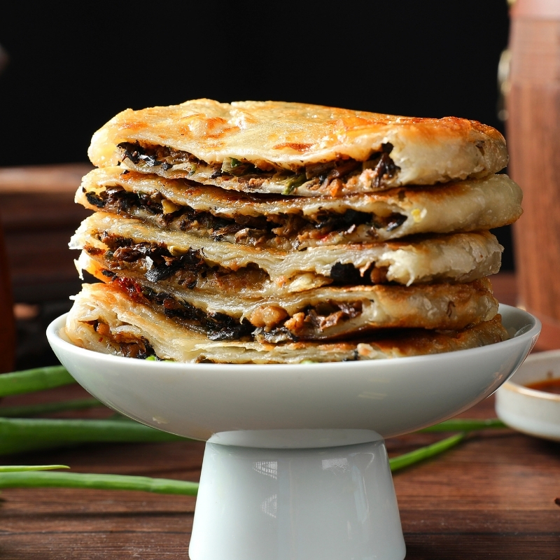 湖北粮全其美食品有限公司梅干菜猪肉馅饼好吃美味可定制，销量全国领先